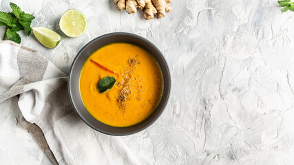 Healthy curcuma Carrot ginger cream soup. Prevention of antiviral infections, banner, catering menu...