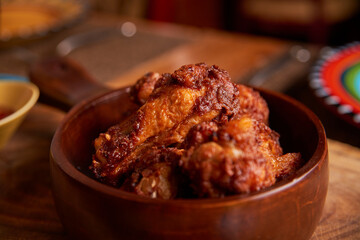 Fried chicken drums in rustic environment