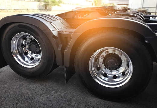 Large a truck wheels tires of semi truck. Cargo road freight. Logistics and transportation.	