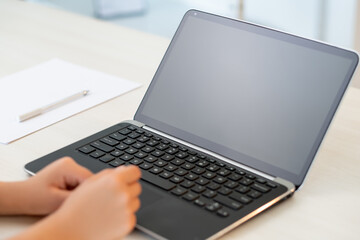 Online business. Freelance work. Remote job. Distance communication. Female hands laptop with empty...