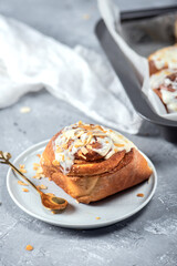 Delicious freshly baked cinnamon rolls with cream