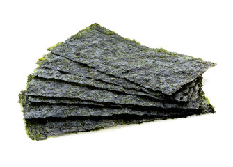 Japanese food nori dry seaweed sheets on white background © pranom