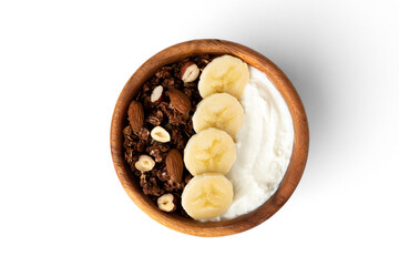 Granola with yogurt, banana and nuts isolated on white background.