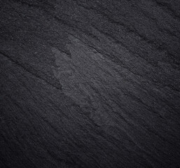 Dark grey black slate background or texture.