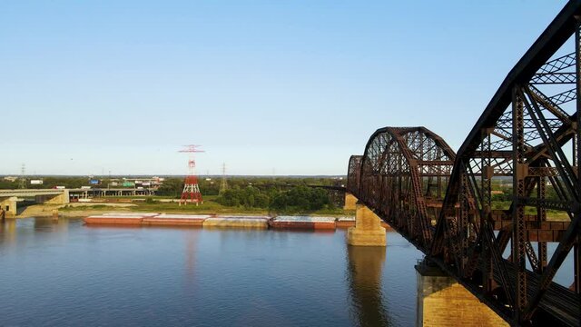 Railroad Bridge Crossing Mississippi River from St. Louis, Missouri - Drone Aerial Establishing View