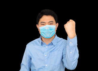 Man wearing mask making fists in front of black background