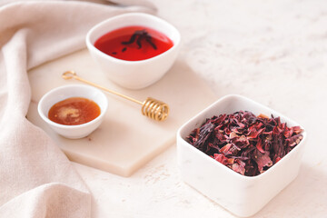 Composition with hibiscus tea on table