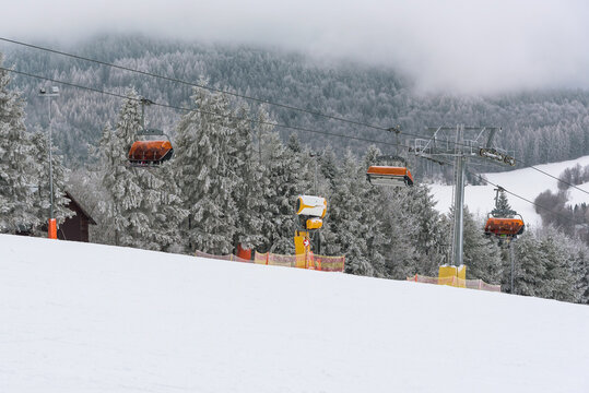 Modern chair lift on a ski slope in Krynica Zdroj - Powered by Adobe