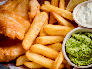 High resolution macro with fish and chips and sauces