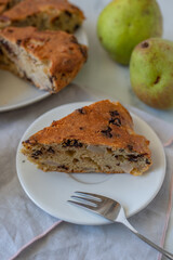 home made vanilla cake with chocolate chips and pears