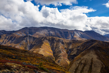 View of Scenic Landscape and Mountains on a Cloudy Day in Canadian Nature. Aerial Shot. Taken in Tombstone Territorial Park, Yukon, Canada.