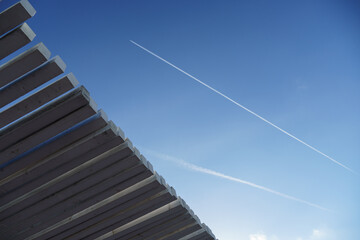 Beautiful aircraft vapor trails, Airplane trails in a blue sky.
