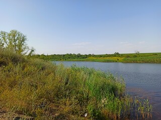 landscape with a river and a sky