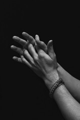 Fototapeta premium men's hands close up on a black background