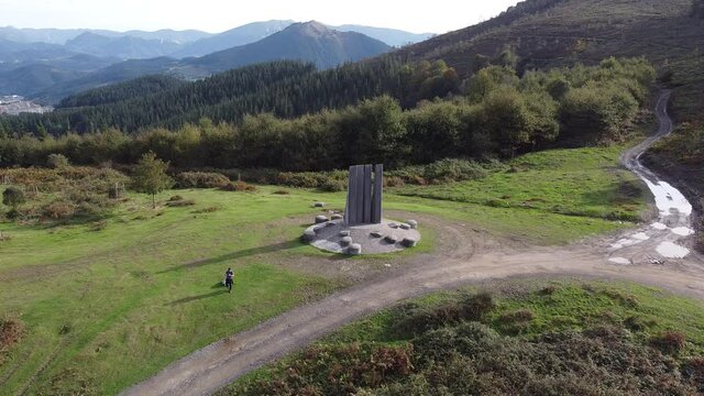 yoshin ogata sculpture in the mountains in the basque country, spain (aerial shot made with drone)