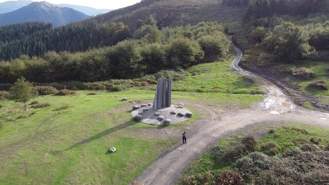 yoshin ogata sculpture in the mountains in the basque country, spain (aerial shot made with drone)