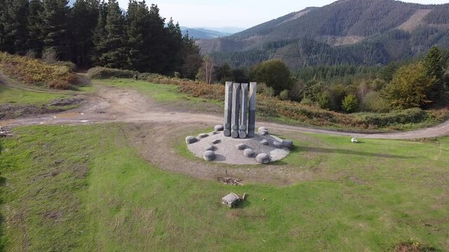 yoshin ogata sculpture in the mountains in the basque country, spain (aerial shot made with drone)