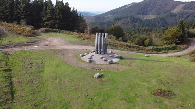 yoshin ogata sculpture in the mountains in the basque country, spain (aerial shot made with drone)