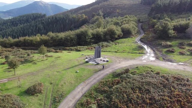 yoshin ogata sculpture in the mountains in the basque country, spain (aerial shot made with drone)