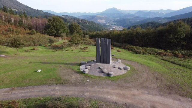 yoshin ogata sculpture in the mountains in the basque country, spain (aerial shot made with drone)