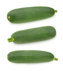Set of fresh whole green vegetable marrow zucchini isolated on a white background.