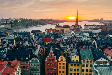 Fotobehang Stortorget plaats in Gamla stan, Stockholm in een prachtige zonsondergang over de stad. © belyaaa
