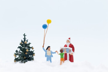 Miniature people, Santa claus and gifts for kid , Christmas and Happy New Year concept.