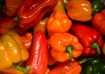 background of fresh red and green bell peppers, harvest concept, virus prevention.