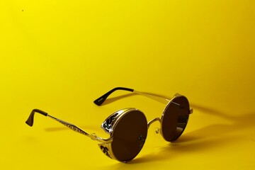 fashion glasses, on a yellow background