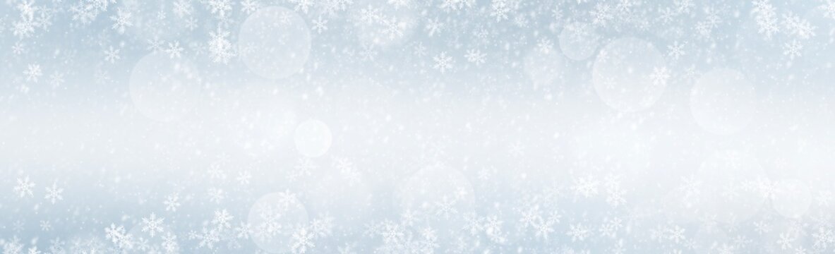 White Snow flake Winter  with bokeh on blue background in Christmas holidays 2020 ,Banner background	