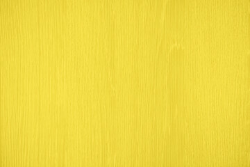 Natural bright yellow wood texture background. Wavy textured plywood, a lot of fiber and small...