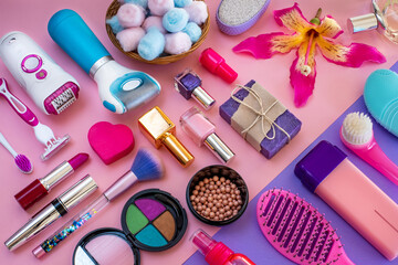 Fototapeta premium Variation of epilation devices and cosmetics on the table