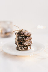 Christmas chocolate chip cookie with lights on white background