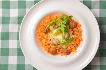 Healthy spaghetti dinner. Traditional Italian pasta with meatballs and cheese. Italian cuisine concept.