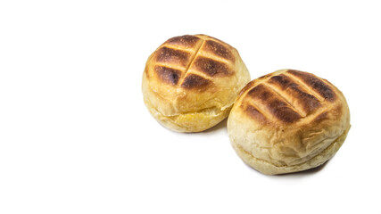 Round bun charcoal grilled serve with crispy bread skin, isolated on the white background.