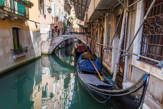 Gandolas at the canal of Venice, Italy