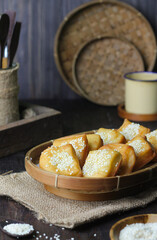 Odading or roti goreng or kue bantal, Indonesian popular traditional fried bread from Bandung, made from bread dough with sesame seed and fry, sweet flavour.