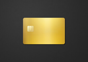 Gold credit card on a black background