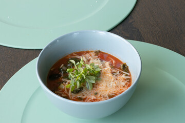 Bowl of minestrone di verdure soup, begin of autumn, winter food cravings. 