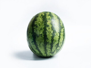 Whole ripe watermelon isolate on the white background.