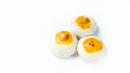 Chinese red beans pastry topping with cashew nut on the white background.