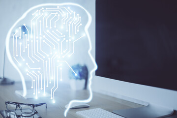 Double exposure of work space with computer and human brain drawing hologram. Brainstorm concept.