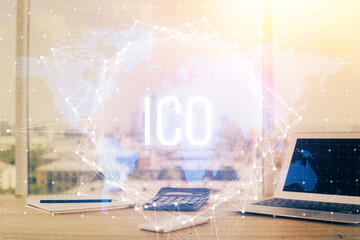 Double exposure of blockchain theme hologram and table with computer background. Concept of bitcoin...