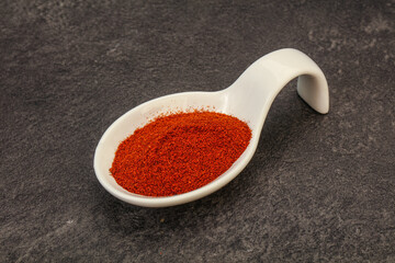 Dry paprika powder in the bowl