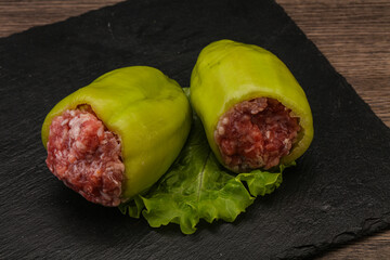 Raw stuffed bell pepper with meat