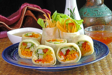 Vegetarian food : Hummus and vegetable wrapped with Tortillas. Tortillas-Hummus Fresh spring rolls , selective focus.
