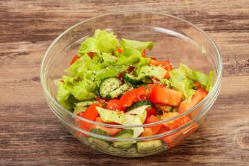 Vegan salad with tomato, cucumber and chia