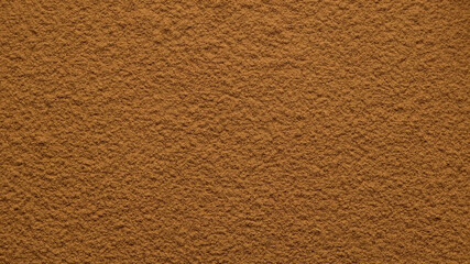 cinnamon powder top view textured