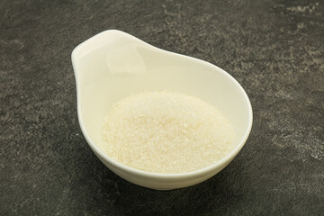 White sugar in the bowl