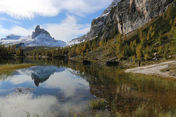 Autumn in the Dolomites, view of Federa lake surrounded by mountains
